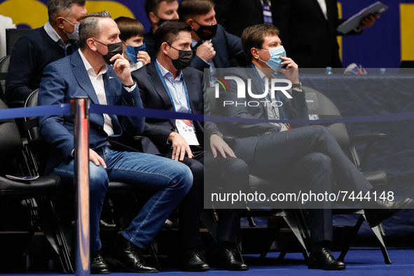 Zenit CEO Alexander Tserkovniy (L) and head coach Xavi Pascual (C) attend the FIBA Basketball World Cup 2023 Qualifying Tournament match bet...