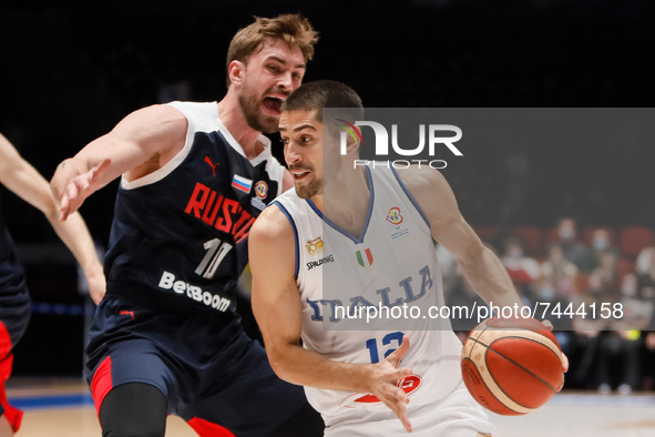 Alexander Gankevich (L) of Russia and Diego Flaccadori of Italy in action during the FIBA Basketball World Cup 2023 Qualifying Tournament ma...
