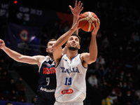 Ivan Strebkov (L) of Russia and Raphael Gaspardo of Italy in action during the FIBA Basketball World Cup 2023 Qualifying Tournament match be...