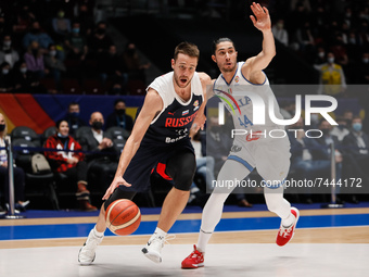 Stanislav Ilnitskiy (L) of Russia and Davide Alviti of Italy in action during the FIBA Basketball World Cup 2023 Qualifying Tournament match...