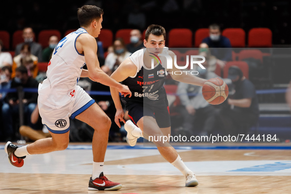 Alexander Khomenko (R) of Russia in action during the FIBA Basketball World Cup 2023 Qualifying Tournament match between Russia and Italy on...