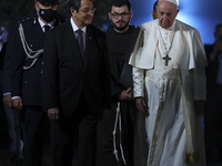 President of Cyprus Nicos Anastasiades, left, and Pope Francis review the honor guard at the Presidential Palace in Nicosia. Cyprus, Thursda...