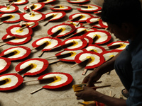 Faculty of Fine Arts (FFA) students passing busy hours to make masks and mascots of bird and animals to celebrate 'Pahela Boishak,' the Beng...