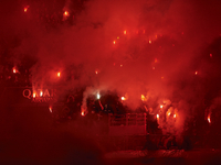 PSG supporters with fireworks and flares during the Ligue 1 Uber Eats match between Paris Saint Germain and FC Nantes at Parc des Princes on...
