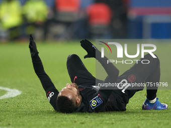 Neymar of PSG lies injured on the pitch during the Ligue 1 Uber Eats match between Paris Saint Germain and FC Nantes at Parc des Princes on...