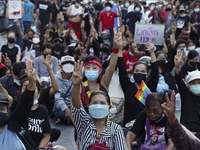 Protester flashes up three finger salute during a demonstration calling for the abolition of the section 112 criminal code lese majeste law...