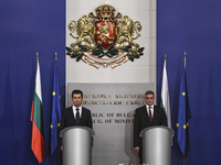 Bulgaria's new Prime Minister and leader of We Continue the Change (PP) party Kiril Petkov  and old Prime minister Stefan Yanev give speach...