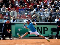 Fabio Fognini of Italy during his straight sets victory against Andy Murray of Great Britain during day three of the Davis Cup World Group Q...
