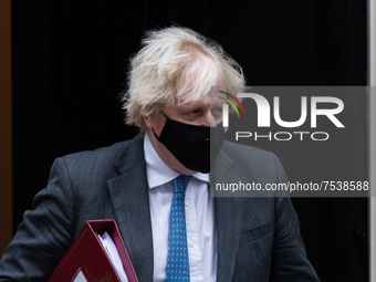 LONDON, UNITED KINGDOM - DECEMBER 15, 2021: British Prime Minister Boris Johnson leaves 10 Downing Street for PMQs at the House of Commons o...