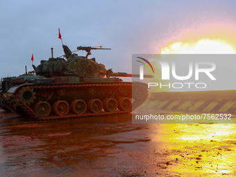 A M60-A3 tank fires cannons during  a live ammunition military drill at an unnamed  location, amid rising tensions with China, in Hsinchu, T...