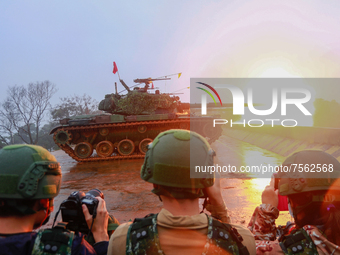 A CM-11 tank fires cannons during   a live ammunition military drill at an unnamed  location, amid rising tensions with China, in Hsinchu, T...