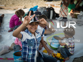 Syrian children are playing with toys and games provided by Volunteers or UNHCR or UNICEF, in Gevgelija, on August 26, 2015. 
The EU is grap...