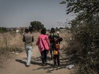 Migrants cross the border between Macedonia and Greece near the Macedonian town of Gevgelija, on August 26, 2015.
The EU is grappling with a...