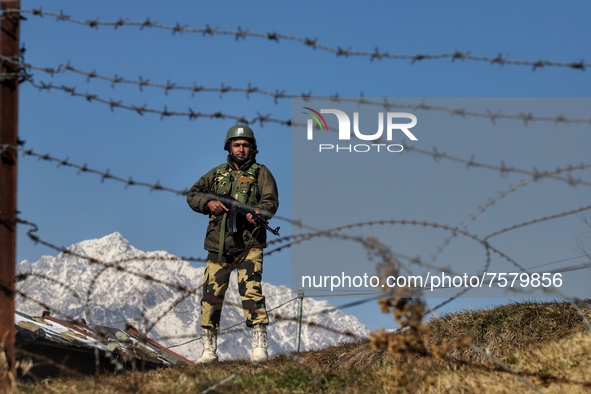 Border Security Force (BSF) soldiers stands alert at a forward post in Baramulla, Jammu and Kashmir, India on 31 December 2021. Irrespective...