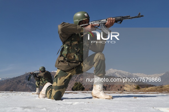 Border Security Force (BSF) soldier taking position during patrolling at a forward post in Baramulla, Jammu and Kashmir, India on 31 Decembe...