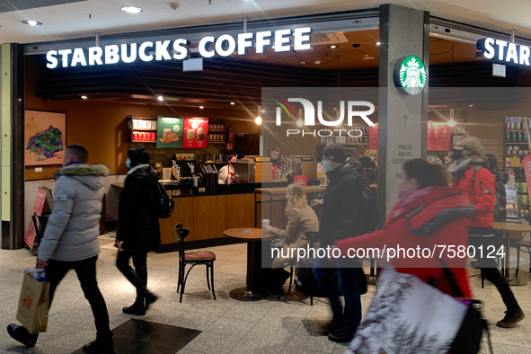 Starbucks Coffe logo is seen on the restaurant at the shopping mall in Krakow, Poland on December 30, 2021. 