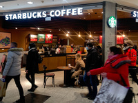Starbucks Coffe logo is seen on the restaurant at the shopping mall in Krakow, Poland on December 30, 2021. (