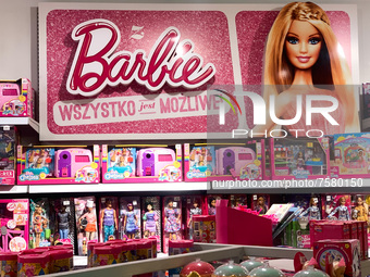 Barbie logo and products are seen at the toy shop in Krakow, Poland on December 30, 2021.  (