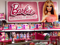 Barbie logo and products are seen at the toy shop in Krakow, Poland on December 30, 2021.  (