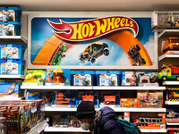 Hot Wheels logo and products are seen at the toy shop in Krakow, Poland on December 30, 2021.  (