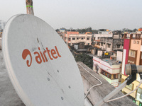 An Airtel DTH dish as seen in top a building in Kolkata , India , on 2 January 2022 . Airtel DTH service grew by 6 % in Q2 of 2021 of over 7...