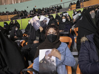 Iranian women hold portraits of the Iranian top IRGC commander, General Qasem Soleimani who was killed in a U.S. drone attack in Baghdad, wh...