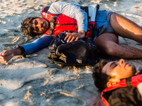 Refugees man collapsion on 30th August 2015 in Kos Islan, Greece.
 Kos on the brink as Mediterranean refugee crisis continues with many boa...