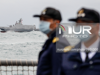 A Taiwanese military corvette sails as navy officers stand guard on a vessel, during a Navy Drill for Preparedness Enhancement ahead of the...