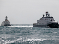 Two Taiwanese military corvettes sail during a Navy Drill for Preparedness Enhancement ahead of the Chinese New Year, amid escalating Chines...