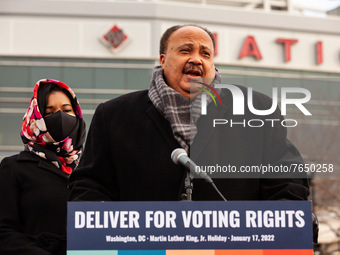 Martin Luther King III speaks during the DC Peace Walk for voting rights.  Martin Luther King III, Arndrea Waters King, and Yolanda Renee Ki...