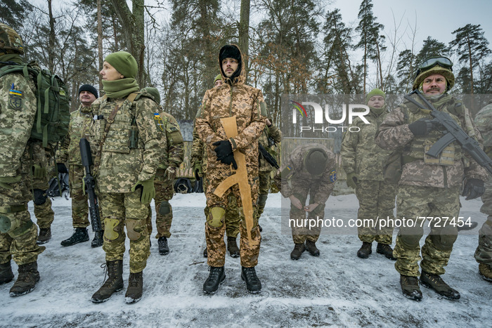 Volunteers of the 112th Territorial Defense Brigade of Kiev during a military exercise for civilians in the outskirts of the city.  Some of...