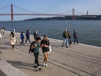 People are seen doing recreational activities in the surroundings of the 25 de abril bridge promenade, Lisbon. 04 February 2022. The Portugu...