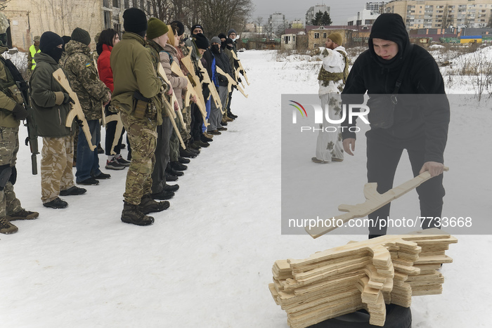 Citizens of Kyiv take part in a open military training for civilians conducted by veterans of the Ukrainian National Guard Azov battalion, a...
