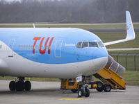 TUI Airlines Belgium Boeing 767-300ER aircraft as seen on final approach flying, landing on the runway and taxiing at Eindhoven Airport EIN...