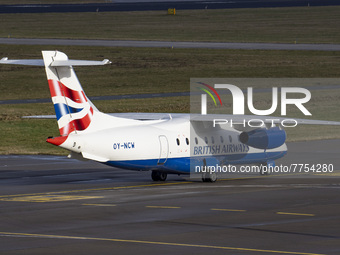 British Airways Dornier Do-328JET-300 aircraft as seen in Eindhoven airport EIN during the taxiing, takeoff, and flying phase departing to A...