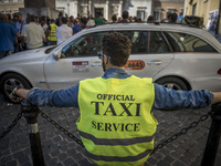 Taxi drivers protest against the amendments for the benefit of Uber, american multinational, in the Montecitorio square in Rome September 10...