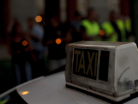 SPAIN, Madrid:taxi drivers lighting candles during the taxi drivers protests front the Ministry of Public Works in Madrid on September 10, 2...