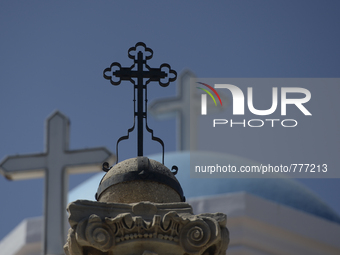 Crosses on the church in Kos town, in Kos, on September 10, 2015. The head of the European Union's executive says 22 of the member states sh...