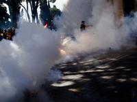 SPAIN, Madrid:taxi drivers lit firecrackers and flares during the second day of taxi drivers protests front the Ministry of Public Works in...