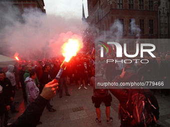 Gdanska, Poland 12th, September 2015 Members of far-right political party ONR and Lechia Gdansk football team fans protest against the imple...