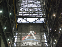 The Artemis Program Banner hangs on the North end of the transfer aisle in the  Vehicle Assembly Building (VAB) at Kennedy Spae Center, Flor...