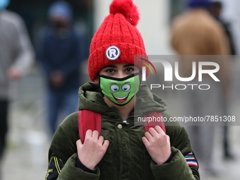 A student wearing a mask walks in the premises of a school in Baramulla Jammu and Kashmir India on 02 March 2022. Schools in Kashmir valley...