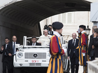 Pope Francis arrives in St. Peter square to hold his weekly general audience (