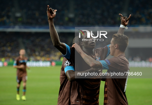 Players FC Porto celebrate the goal scored during his first Champions League match between FC Dynamo Kyiv and FC Porto Olympic stadium in Ki...