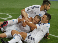 Oleh Gusev (C) of Dynamo celebrates with teammates after scoring during the UEFA Champions League group stage, Group G, soccer match between...