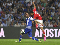 Benfica's Portuguese forward Gonçalo Guedes (R) in action with Porto's Mexican defender Miguel Layún (L) during the Premier League 2015/16 m...