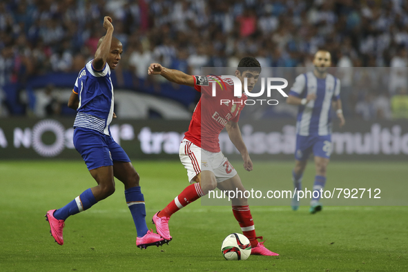 Porto's Algerian forward Yacine Brahimi and Benfica's Portuguese forward Gonçalo Guedes in action during the Premier League 2015/16 match be...