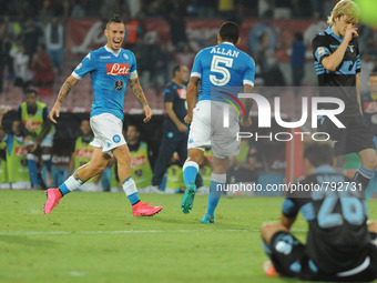 Allan of SSC Napoli celebrates with team mates during the italian Serie A football match between SSC Napoli and at San Paolo Stadium on Sept...
