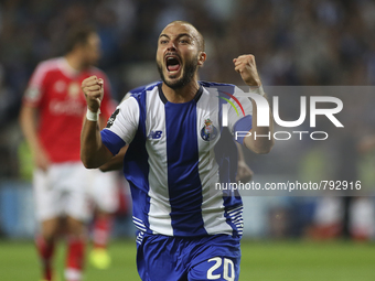 Porto's Portuguese midfielder André André celebrates after scoring goal during the Premier League 2015/16 match between FC Porto and SL Benf...