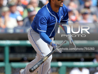 Kansas City Royals' Christian Colon hits a single during the second inning of a baseball game against the Detroit Tigers in Detroit, Michiga...